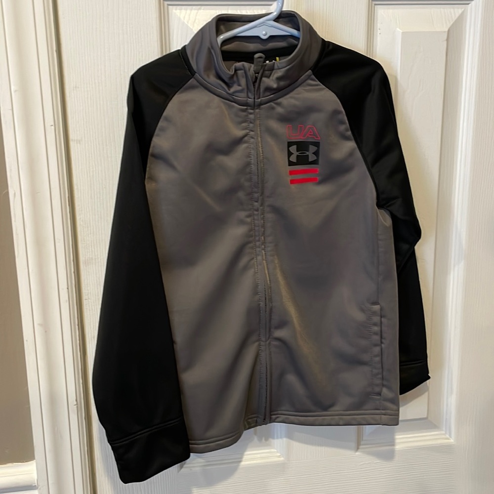Under Armour size 6 boys zip up track jacket.